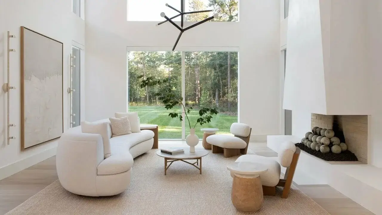 A modern, minimalist living room with clean lines and abundant natural light