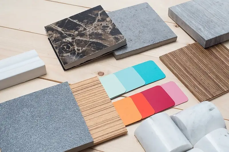 A collection of material samples including wood, marble, and fabric