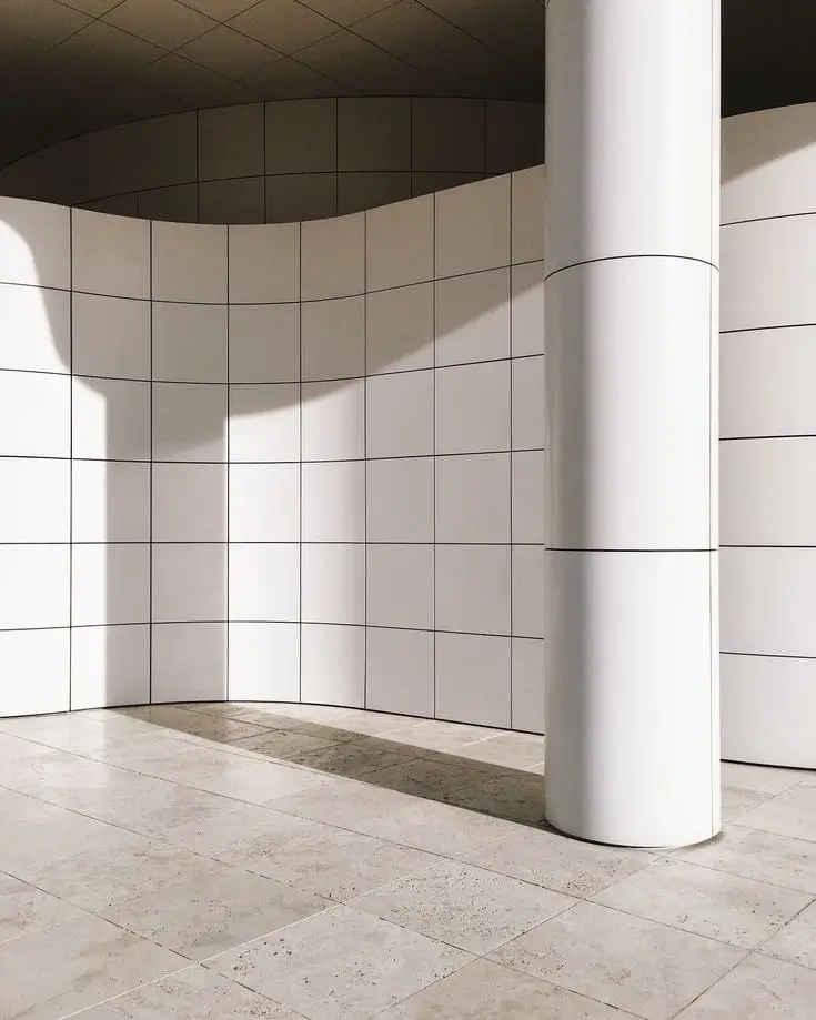An interesting architectural shadow cast on a clean white wall