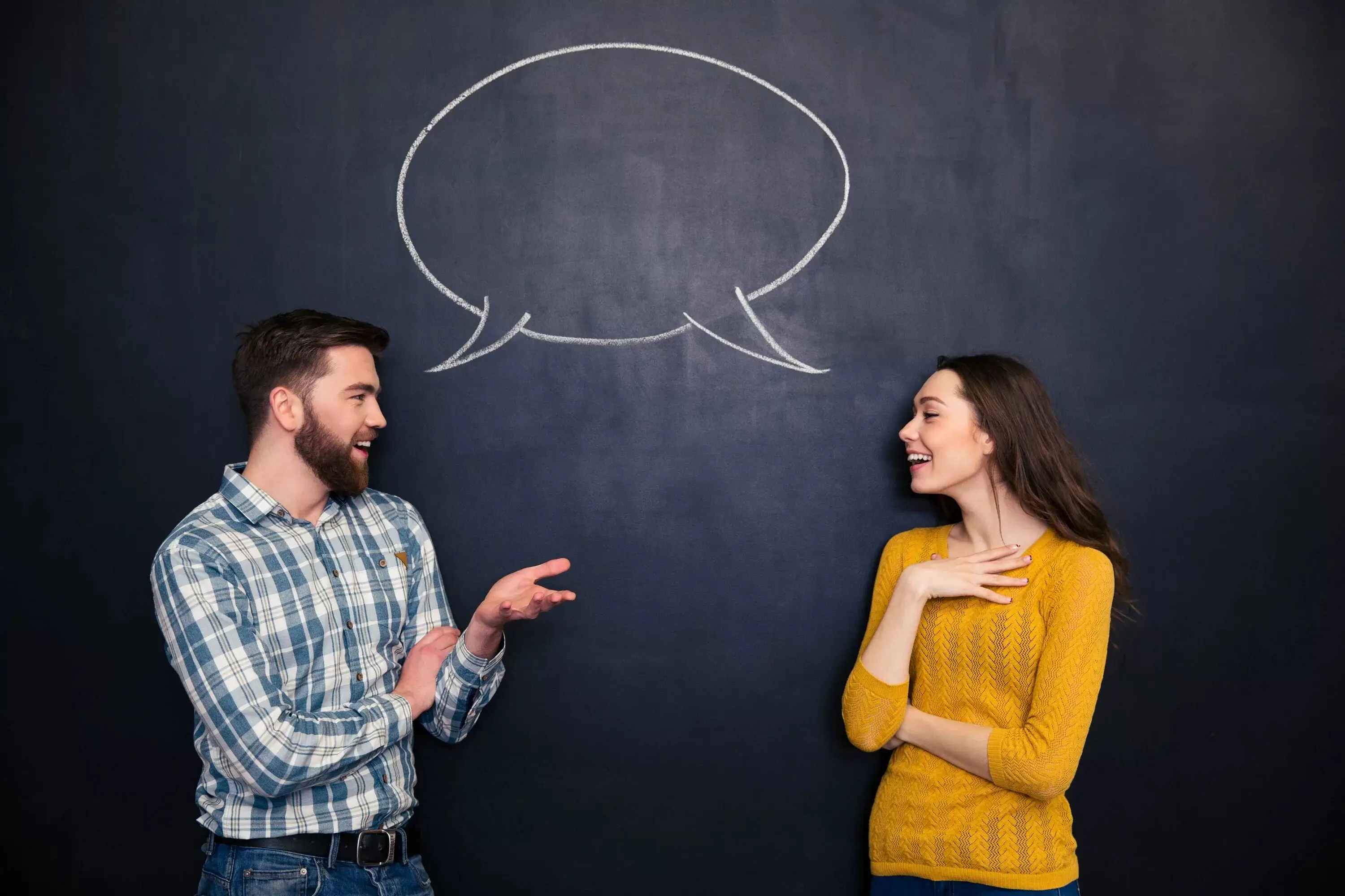Two people having an intense, focused conversation